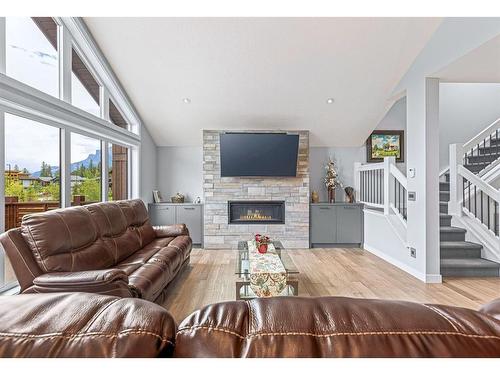 494 Stewart Creek Close, Canmore, AB - Indoor Photo Showing Living Room With Fireplace