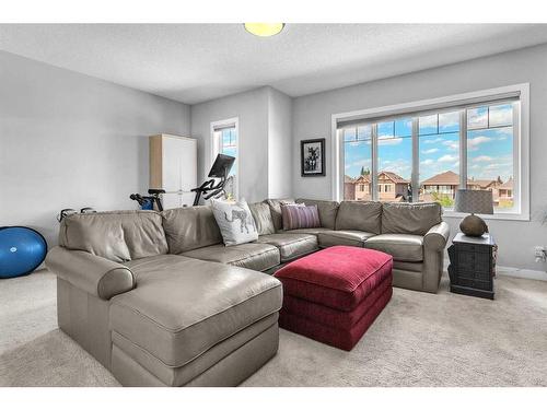 327 Shawnee Boulevard Sw, Calgary, AB - Indoor Photo Showing Living Room