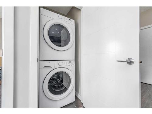 215-8 Sage Hill Terrace Nw, Calgary, AB - Indoor Photo Showing Laundry Room
