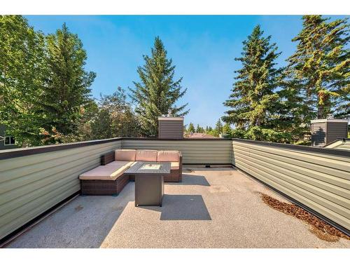203-26 Glamis Green Sw, Calgary, AB - Outdoor With Deck Patio Veranda