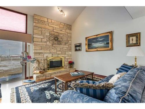 33022 Township Road 250, Rural Rocky View County, AB - Indoor Photo Showing Other Room With Fireplace