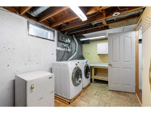 235 Tache Avenue Nw, Calgary, AB - Indoor Photo Showing Laundry Room