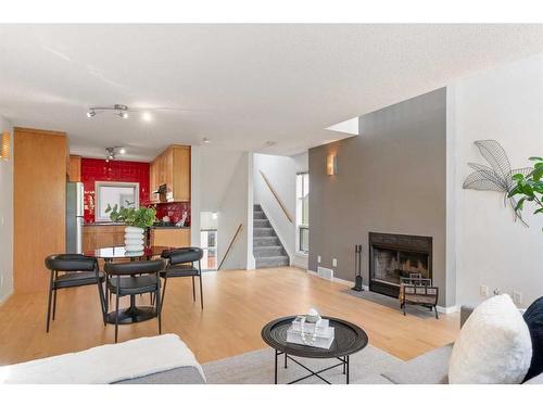 6-52 6 Street Ne, Calgary, AB - Indoor Photo Showing Living Room With Fireplace