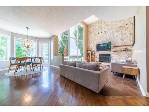86 Mt Kidd Gardens Se, Calgary, AB - Indoor Photo Showing Living Room With Fireplace