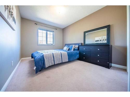 86 Mt Kidd Gardens Se, Calgary, AB - Indoor Photo Showing Bedroom