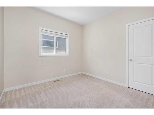 306 Carringvue Manor Nw, Calgary, AB - Indoor Photo Showing Other Room