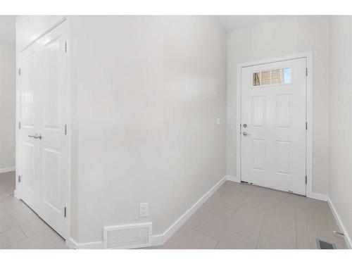 306 Carringvue Manor Nw, Calgary, AB - Indoor Photo Showing Other Room