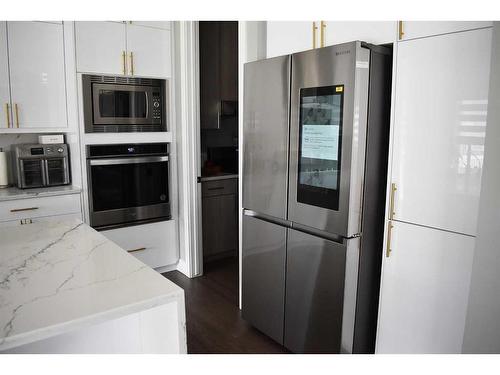 116 Sandpiper Landing, Chestermere, AB - Indoor Photo Showing Kitchen With Stainless Steel Kitchen