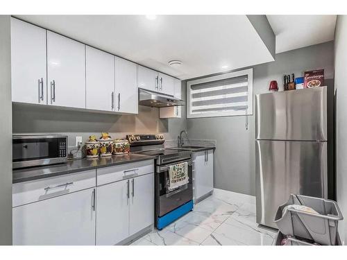 116 Sandpiper Landing, Chestermere, AB - Indoor Photo Showing Kitchen With Stainless Steel Kitchen