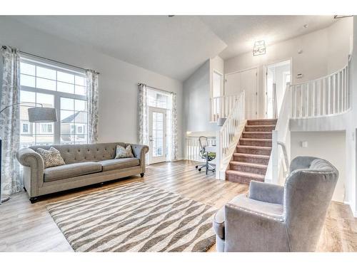 25 Yorkstone Way Sw, Calgary, AB - Indoor Photo Showing Living Room