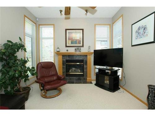 35 Wentworth Gardens Sw, Calgary, AB - Indoor With Fireplace