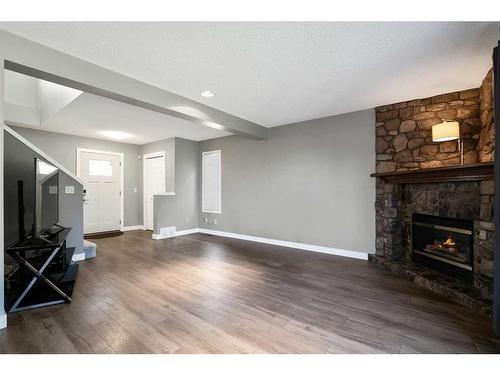 15 Cimarron Meadows Crescent, Okotoks, AB - Indoor With Fireplace