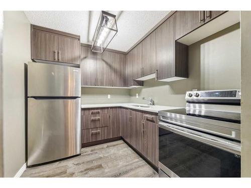 1313-315 Southampton Drive Sw, Calgary, AB - Indoor Photo Showing Kitchen With Stainless Steel Kitchen