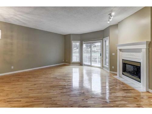 42 Hamptons Link Nw, Calgary, AB - Indoor With Fireplace