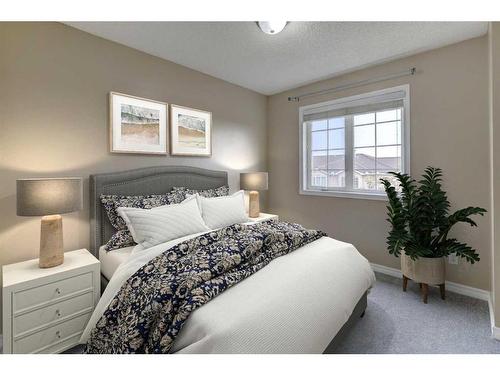 42 Hamptons Link Nw, Calgary, AB - Indoor Photo Showing Bedroom