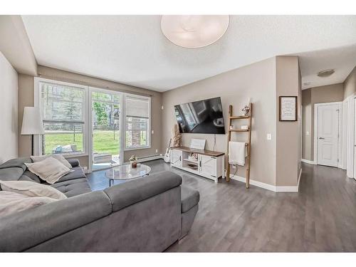 108-76 Panatella Road Nw, Calgary, AB - Indoor Photo Showing Living Room