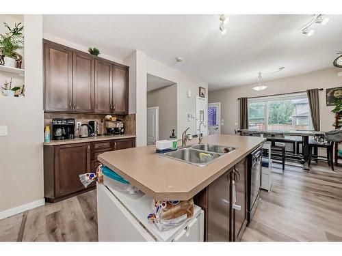 161 Walden Manor Se, Calgary, AB - Indoor Photo Showing Kitchen With Double Sink