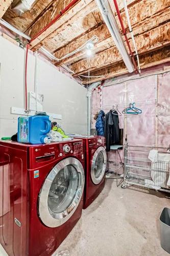 161 Walden Manor Se, Calgary, AB - Indoor Photo Showing Laundry Room