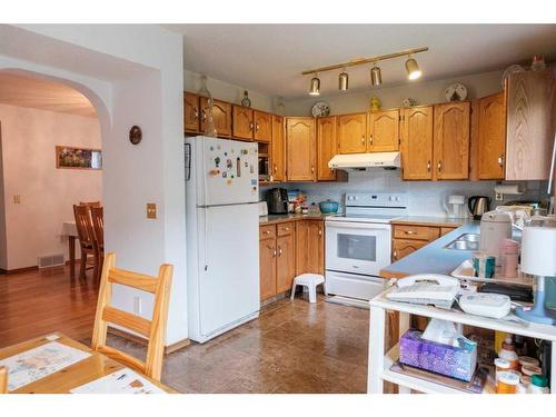 319 Hidden Vale Place Nw, Calgary, AB - Indoor Photo Showing Kitchen