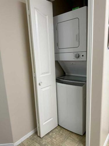 205-5000 Somervale Court Sw, Calgary, AB - Indoor Photo Showing Laundry Room