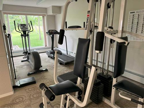 205-5000 Somervale Court Sw, Calgary, AB - Indoor Photo Showing Gym Room