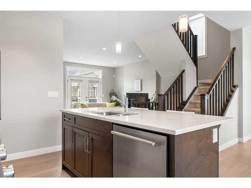 831 85 Street Sw, Calgary, AB - Indoor Photo Showing Kitchen With Double Sink