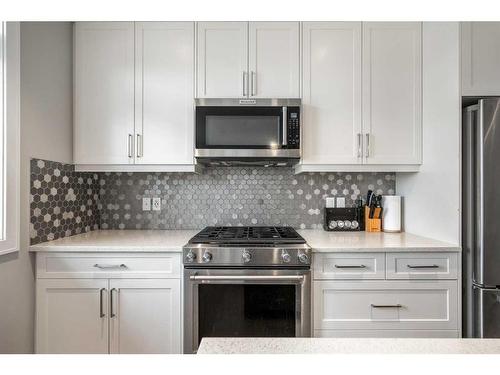 831 85 Street Sw, Calgary, AB - Indoor Photo Showing Kitchen With Stainless Steel Kitchen With Upgraded Kitchen