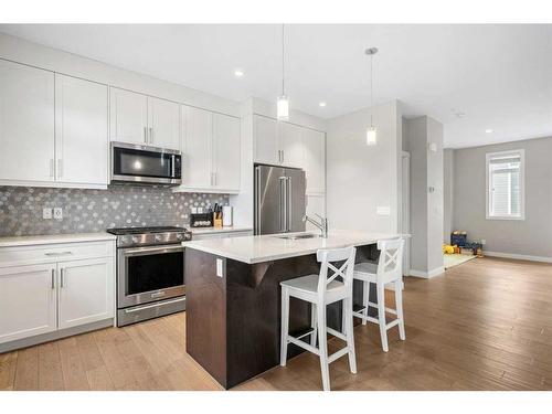 831 85 Street Sw, Calgary, AB - Indoor Photo Showing Kitchen With Stainless Steel Kitchen With Upgraded Kitchen