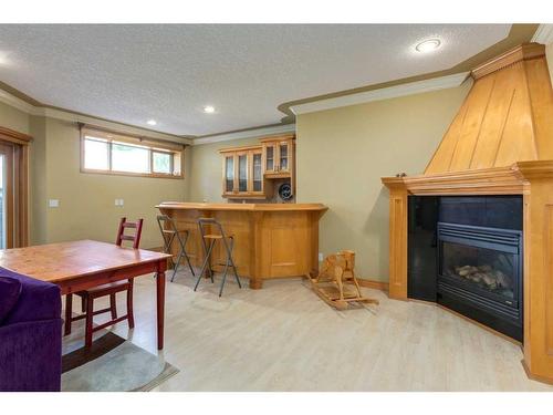 5 Simcoe Rise Sw, Calgary, AB - Indoor With Fireplace