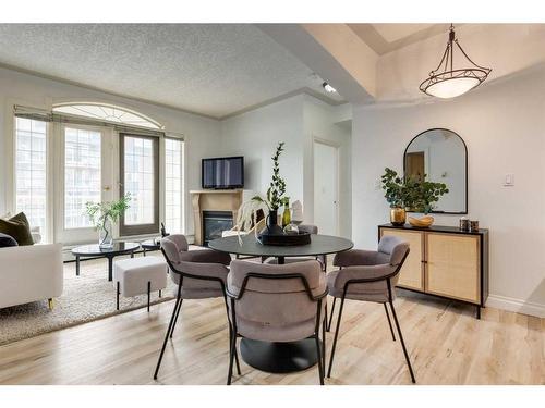 406-1315 12 Avenue Sw, Calgary, AB - Indoor With Fireplace