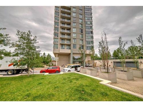 306-77 Spruce Place Sw, Calgary, AB - Outdoor With Balcony With Facade
