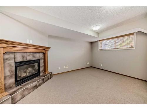 86 Silverado Saddle Crescent Sw, Calgary, AB - Indoor With Fireplace