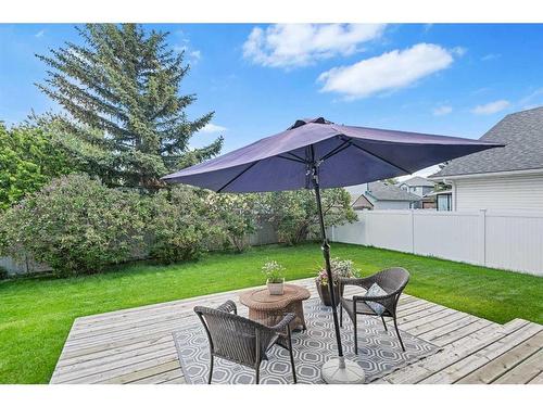 105 Somerset Close Sw, Calgary, AB - Outdoor With Deck Patio Veranda With Backyard