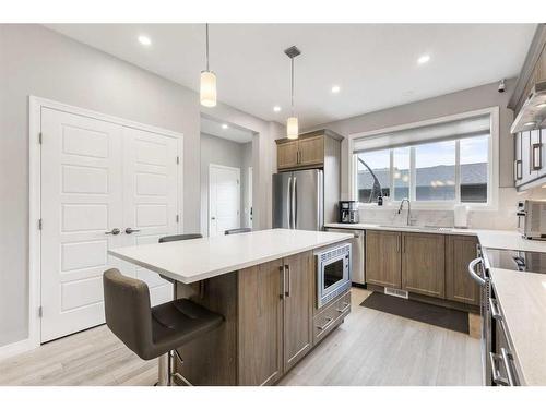 59 Wolf Creek Manor Se, Calgary, AB - Indoor Photo Showing Kitchen With Upgraded Kitchen