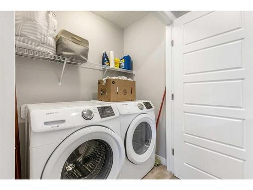 59 Wolf Creek Manor Se, Calgary, AB - Indoor Photo Showing Laundry Room