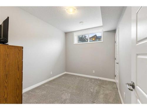 59 Wolf Creek Manor Se, Calgary, AB - Indoor Photo Showing Other Room