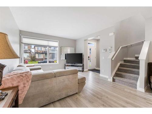 59 Wolf Creek Manor Se, Calgary, AB - Indoor Photo Showing Living Room