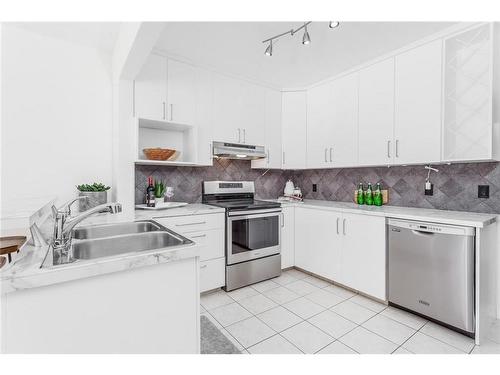 443 31 Avenue Nw, Calgary, AB - Indoor Photo Showing Kitchen With Double Sink