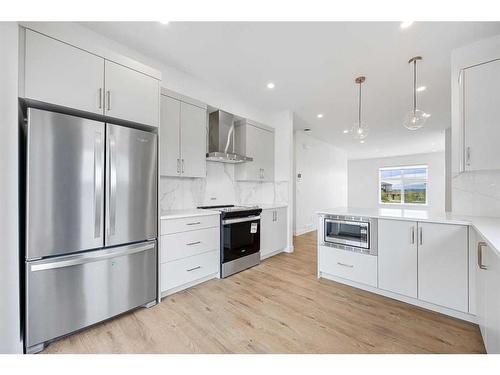 585 Mahogany Road Se, Calgary, AB - Indoor Photo Showing Kitchen With Upgraded Kitchen