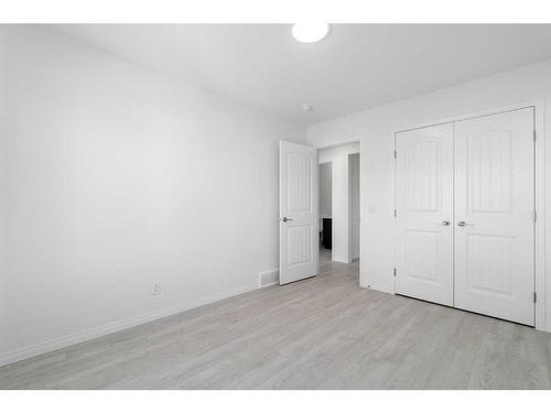 15 Heirloom Boulevard Se, Calgary, AB - Indoor Photo Showing Other Room