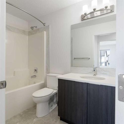 15 Heirloom Boulevard Se, Calgary, AB - Indoor Photo Showing Bathroom