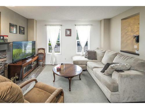 362 Copperfield Grove Se, Calgary, AB - Indoor Photo Showing Living Room