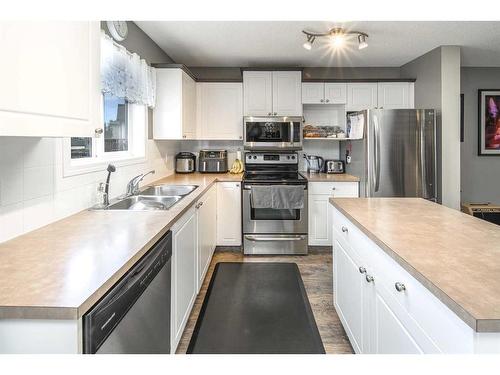 362 Copperfield Grove Se, Calgary, AB - Indoor Photo Showing Kitchen With Stainless Steel Kitchen With Double Sink