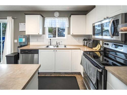 362 Copperfield Grove Se, Calgary, AB - Indoor Photo Showing Kitchen With Stainless Steel Kitchen With Double Sink