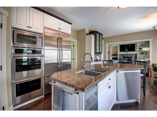 55 Mckenzie Lake Landing Se, Calgary, AB - Indoor Photo Showing Kitchen With Stainless Steel Kitchen With Double Sink With Upgraded Kitchen