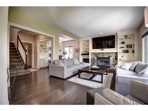 55 Mckenzie Lake Landing Se, Calgary, AB - Indoor Photo Showing Living Room With Fireplace