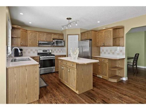 10971 Valley Ridge Drive Nw, Calgary, AB - Indoor Photo Showing Kitchen With Double Sink