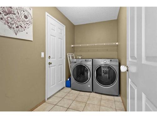 10971 Valley Ridge Drive Nw, Calgary, AB - Indoor Photo Showing Laundry Room