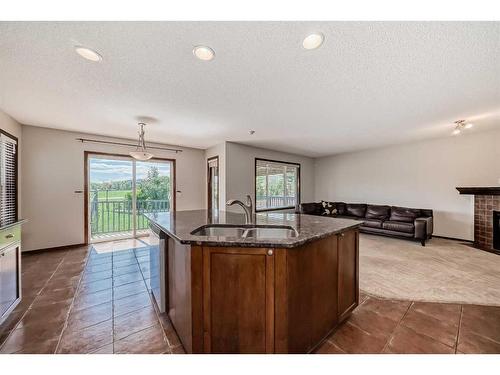 328 Eversyde Way Sw, Calgary, AB - Indoor Photo Showing Kitchen With Double Sink