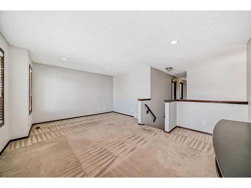 328 Eversyde Way Sw, Calgary, AB - Indoor Photo Showing Other Room